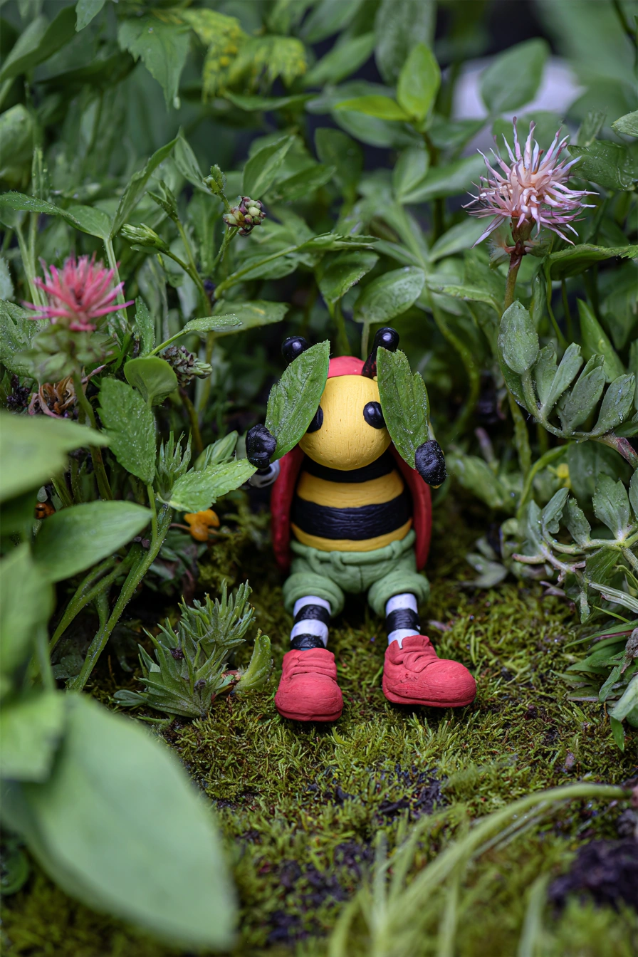 Playful Clay Bee Hiding in Nature