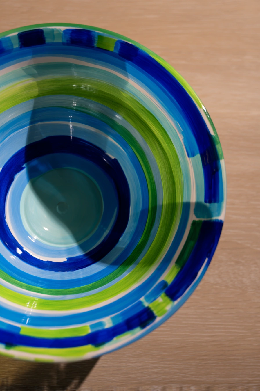 Vibrant Striped Clay Bowl